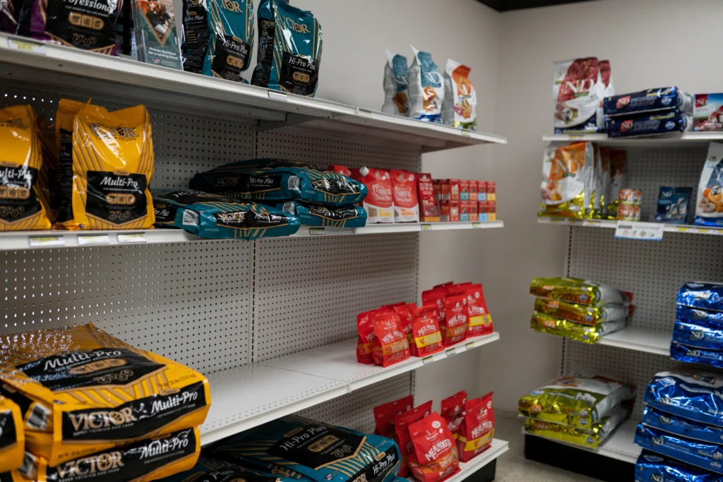 Dog food sitting on shelves
